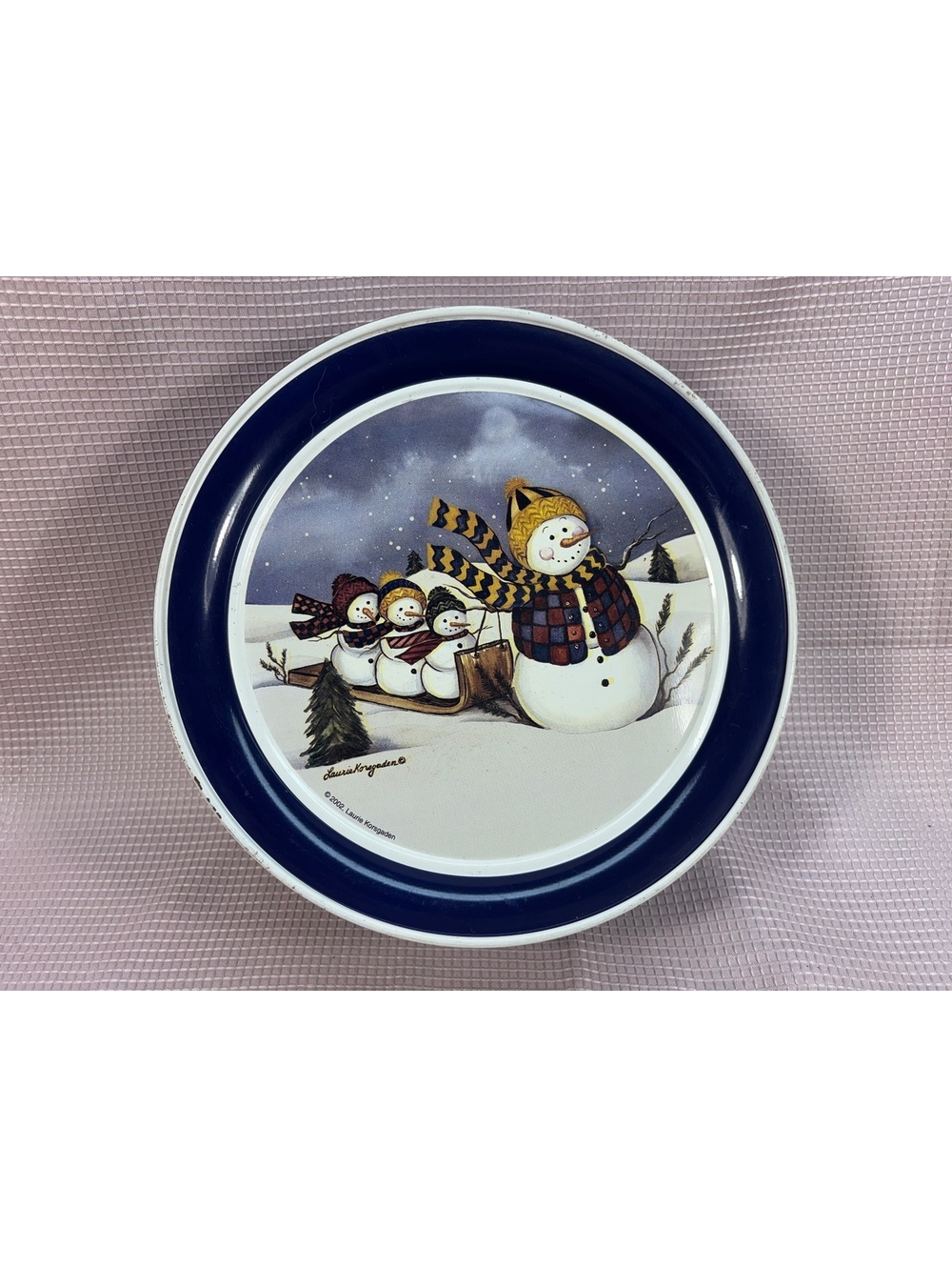 281 - snowman sledding decorative Christmas holiday tin artwork Laurie Korsgaden